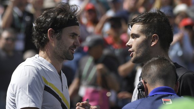 Roger Federer, of Switzerland, left, greets Borna Coric, of Croatia, after Federer beat Coric.