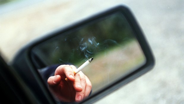 Thousands of Queenslanders have been fined for smoking in cars carrying children.
