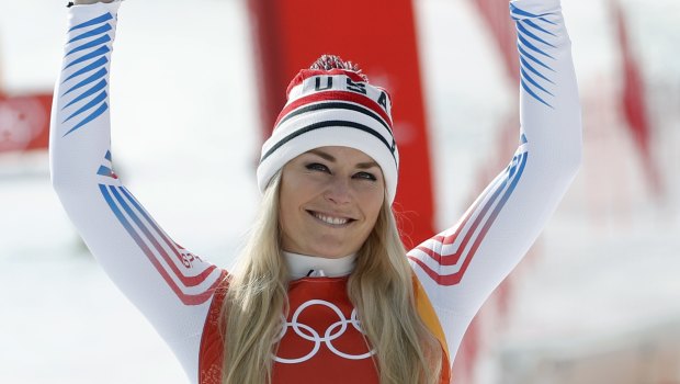Vonn acknowledges the crowd on as she steps up to the podium.