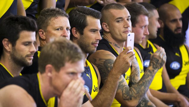 In the frame for another flag: Dustin Martin keens an eye on Alex Rance's selfie.
