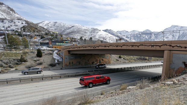 Vehicles pass under a bridge in Salt Lake City. Utah is the nation's biggest proponents and user of the bridge construction method that was used in the Florida bridge that collapsed.
