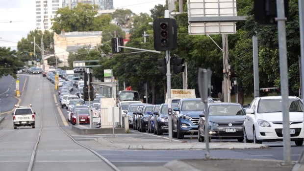 Traffic is gridlock on Racecourse road in Flemington on Monday morning.
