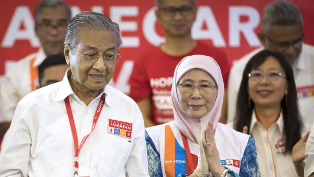Unlikely alliance: Former prime minister Mahathir Mohamad at a rally in Shah Alam, Malaysia, earlier this month, with opposition leader Wan Azizah Wan Ismail. 
