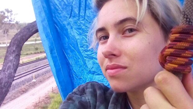 Tayla Jay Haggarty, from Frontline Action on Coal, was arrested after allegedly suspending herself from ropes, attached to a coal rail line.