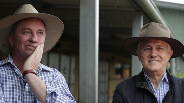 Prime Minister Malcolm Turnbull and candidate for New England Barnaby Joyce at a polling booth  in Tamworth during the New England by-election 