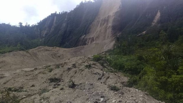 Debris from a massive landslide from Monday's earthquake covers an area in Tabubil township, Papua New Guinea. 