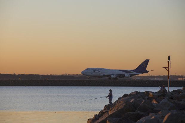 A rock fisherman fishes at Botany Bay at the mouth of the Cooks River, where the EPA has issued  warnings about eating too much of certain fish beacuse of chemical concentrations.