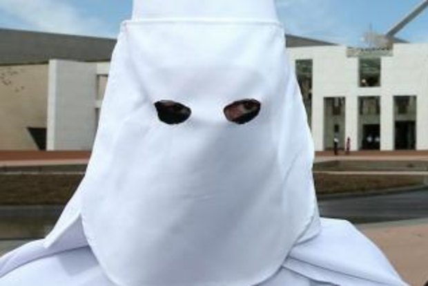 Men wearing Ku Klux Klan outfit, motorbike helmet and niqab try to enter  Parliament House in Canberra - ABC News