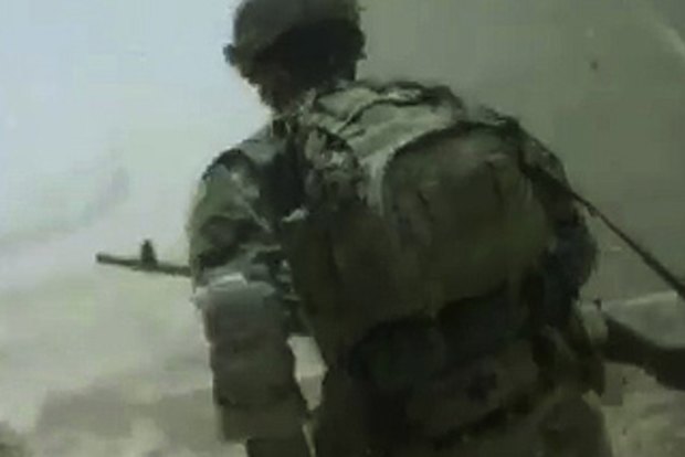 Battle footage shows Afghan insurgent 'using child as human shield'