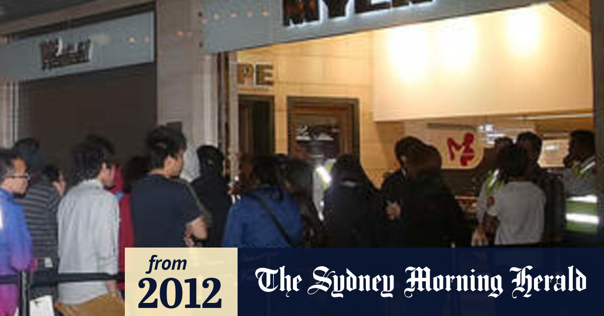 Bargain Hunters Queue Up Early As Stores Look To Cash In