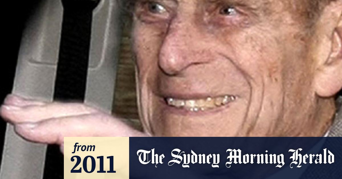 Smiling Prince Philip leaves hospital