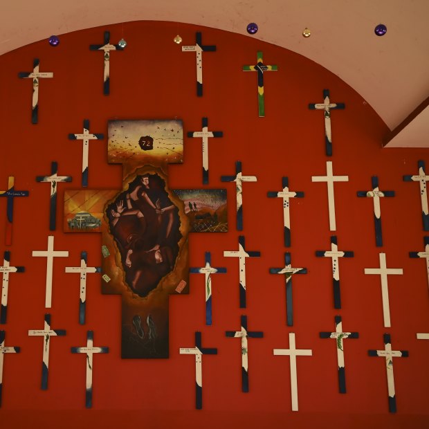 On a chapel wall in shelter La 72 in Mexico, 72 crosses mark the lives lost in a cartel massacre in San Fernando in 2010. 