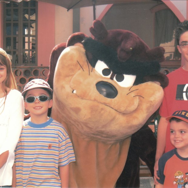 On a family holiday at Movieworld in 2004 (from left) Courtney, Zachary, Brodie and Kris.