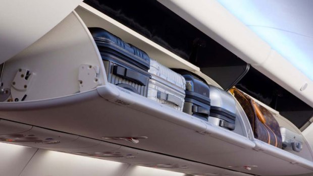 Cabin bag crackdown Jetstar to introduce cabin baggage officers to stop oversize carry on bags