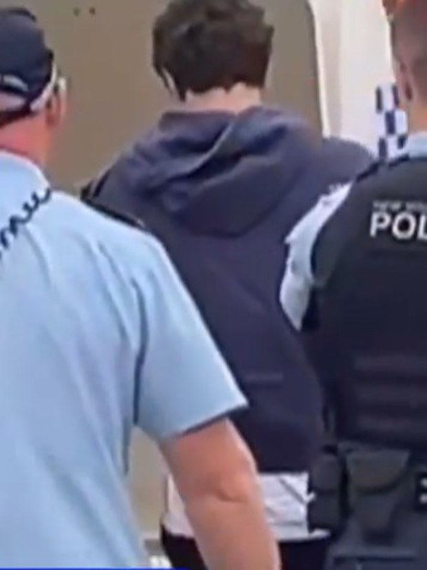 Driver arrested after car allegedly hits Newcastle Knights fans preparing to farewell their team as they headed off for the NRL grand final.