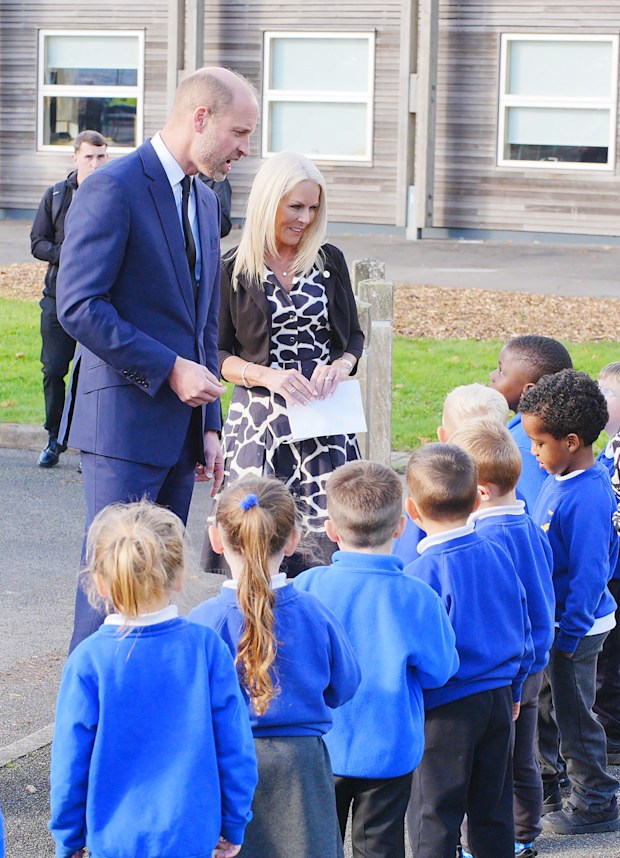 Prince William, Prince of Wales with students during his visit to Ynysowen Community Primary School to unveil the Aberfan Memorial Tree to mark the 60th anniversary of the Aberfan disaster on October 21, 2026 in Merthyr Tydfil, Wales