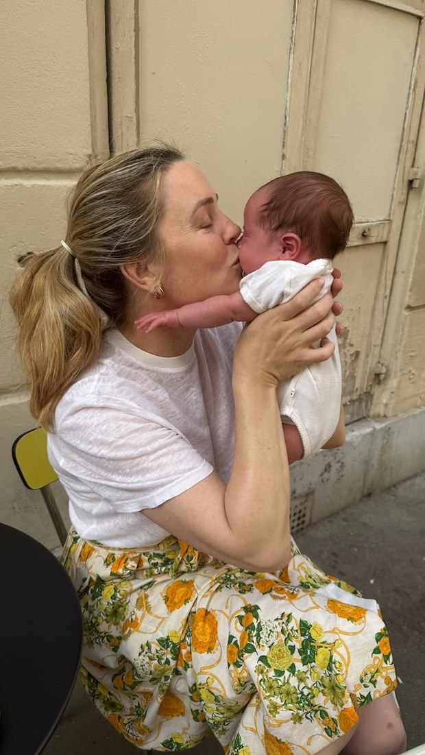 Melissa George with her fourth son and newborn