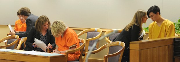 From left, Kayden McIntosh, 16, Denali Brehmer, 18, and Caleb Leyland, 19, are arraigned by a Superior court judge in the Nesbett Courthouse in Anchorage, Alaska. Photo by Bill Roth/Anchorage Daily News/TNS/Sipa USA.