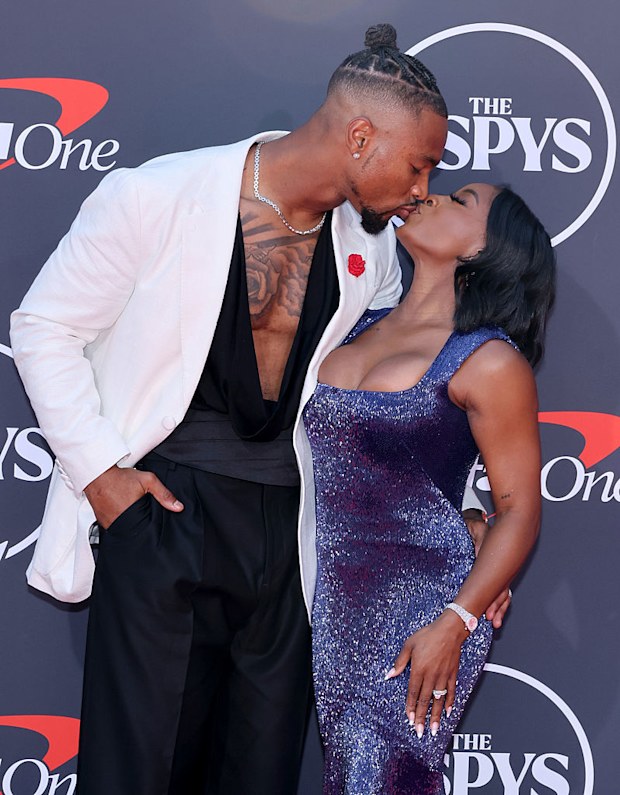 HOLLYWOOD, CALIFORNIA - JULY 16: (L-R) Jonathan Owens and Simone Biles attend the 2025 ESPY Awards at Dolby Theatre on July 16, 2025 in Hollywood, California.