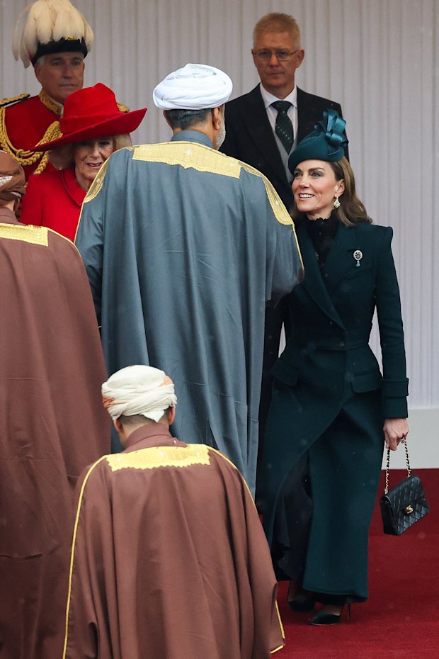 Queen Camilla, background left, and Kate, Princess of Wales, welcome From left, Sultan Haitham bin Tarik of Oman