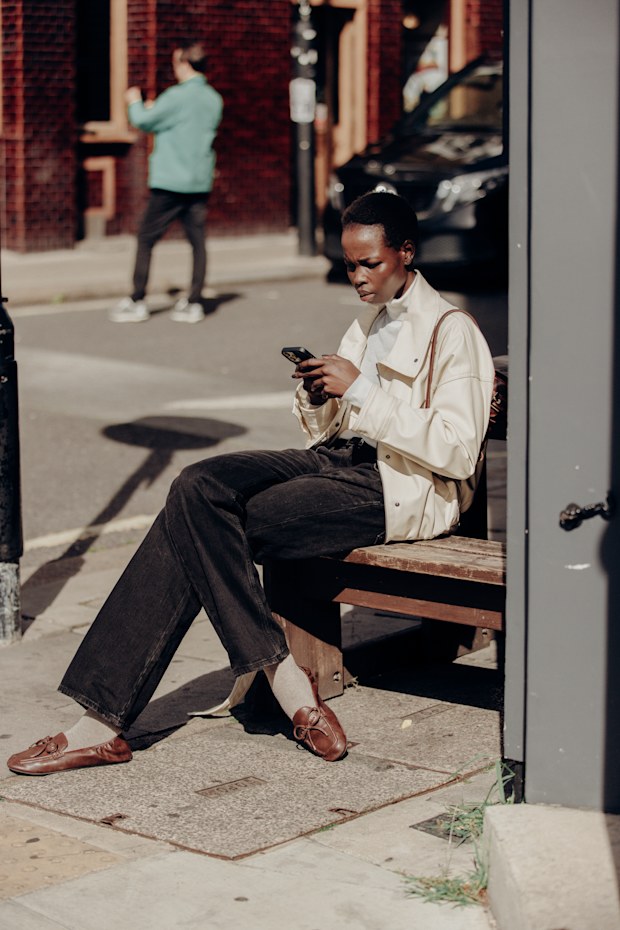 Street Style at London RTW Spring-Summer 2027 fashion week on September 21, 2026 in London, England.