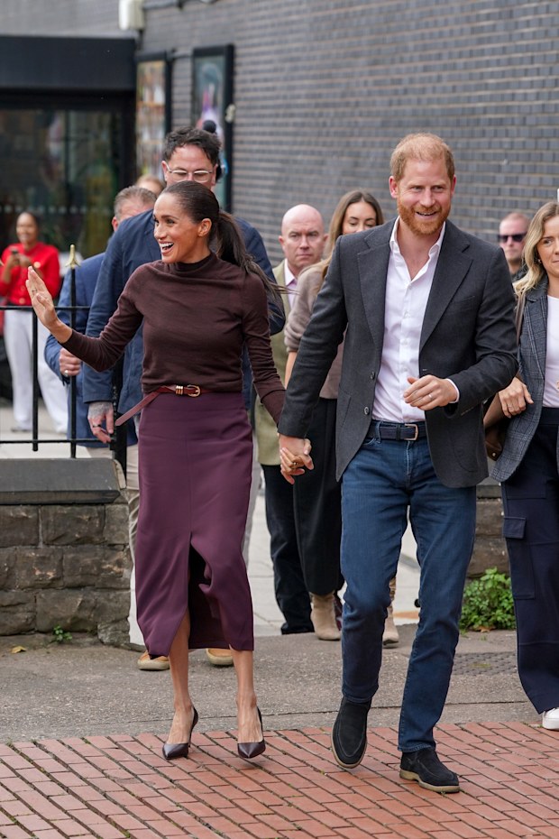 Meghan, Duchess of Sussex, and Prince Harry, Duke of Sussex, arrive at Himmah Hub, a food poverty community action group