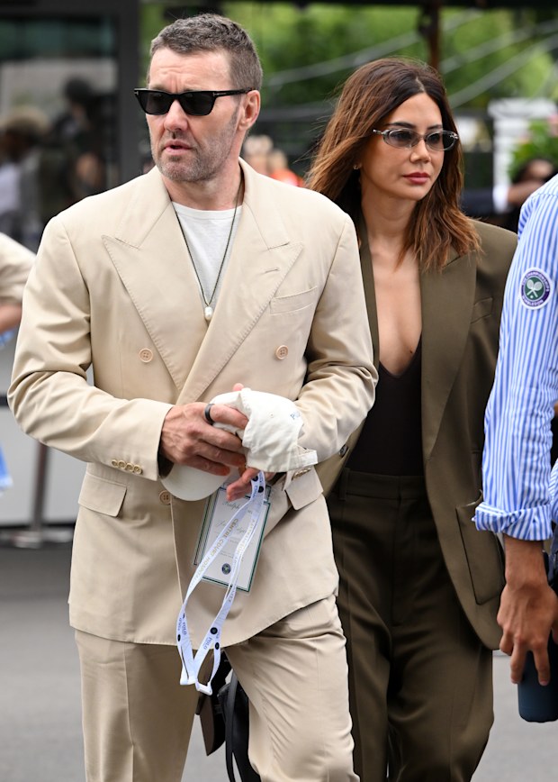 Joel Edgerton and Christine Centenera at the 2026 Wimbledon Tennis Championships at All England Lawn Tennis and Croquet Club on July 05, 2026 in London, England.