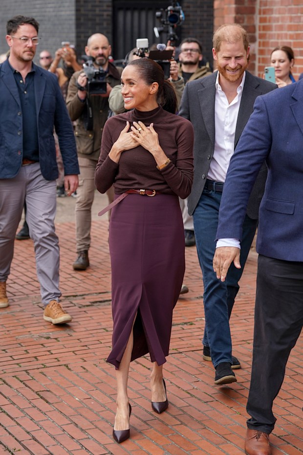Meghan, Duchess of Sussex, and Prince Harry, Duke of Sussex, arrive at Himmah Hub, a food poverty community action group