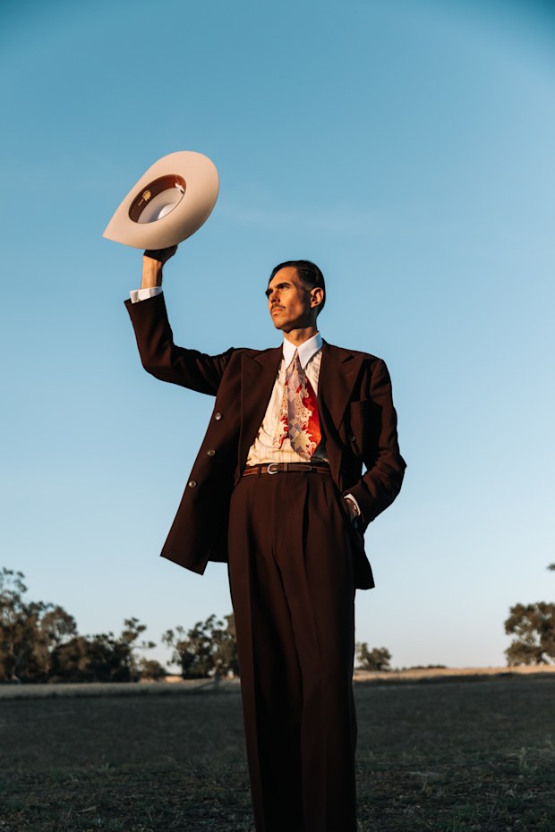 Dirk Fourie (@dirkthecrook) wearing pleated pants