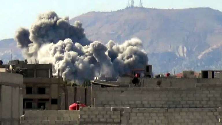 Fighting surges south of Damascus