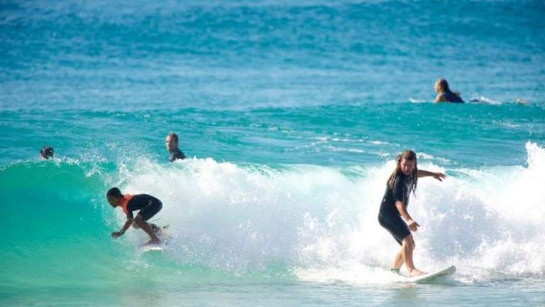 Surfing world champion Mark Occhilupo's son signed by Billabong