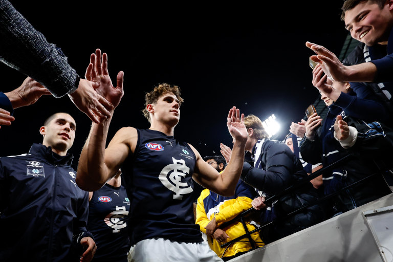 Melbourne, Australia. 02nd June, 2023. Patrick Cripps of Carlton leads  teammates from the field during the AFL Round 12 match between the  Melbourne Demons and the Carlton Blues at the Melbourne Cricket