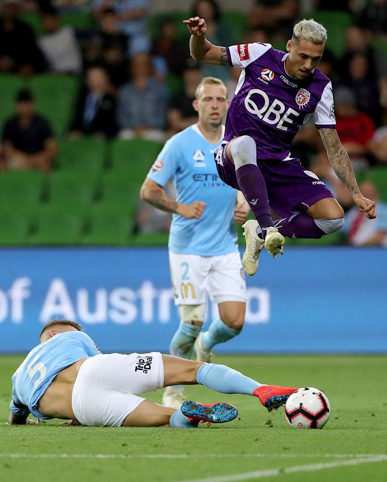 Jason Davidson hurdles City's Bart Schenkeveld.