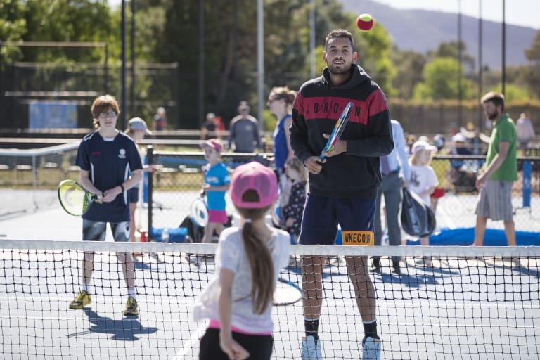 Nick Kyrgios got back to his tennis roots at Lyneham on Saturday.