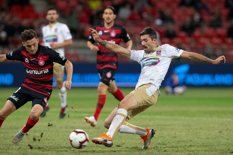 Uneaqual footing: The pitch at Spotless Stadium was substandard.