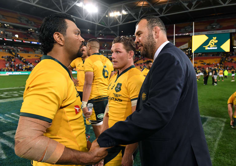 Michael Cheika congratulates Kurtley Beale following the win.