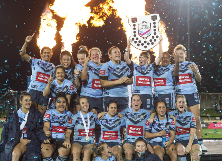 That's one: NSW celebrate their victory in the inaugural Women's State of Origin match.