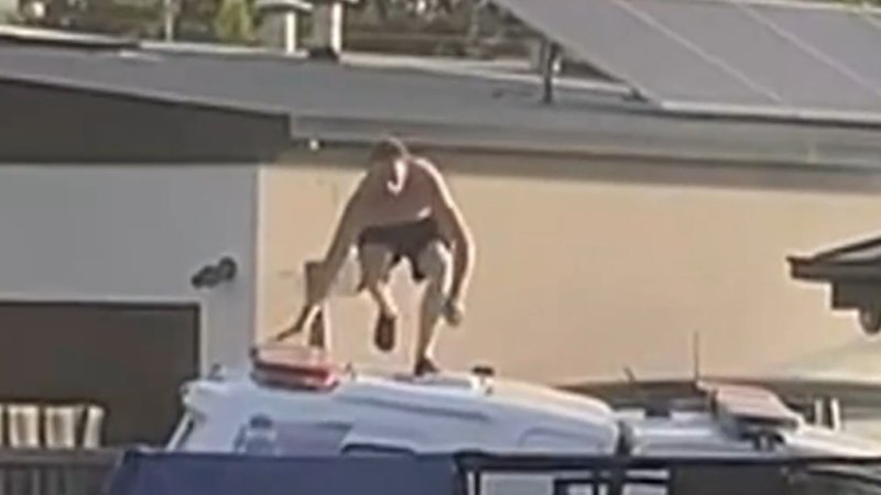 Shirtless man runs from scene after police car rammed
