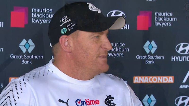 Voss reacts to Docherty's spray