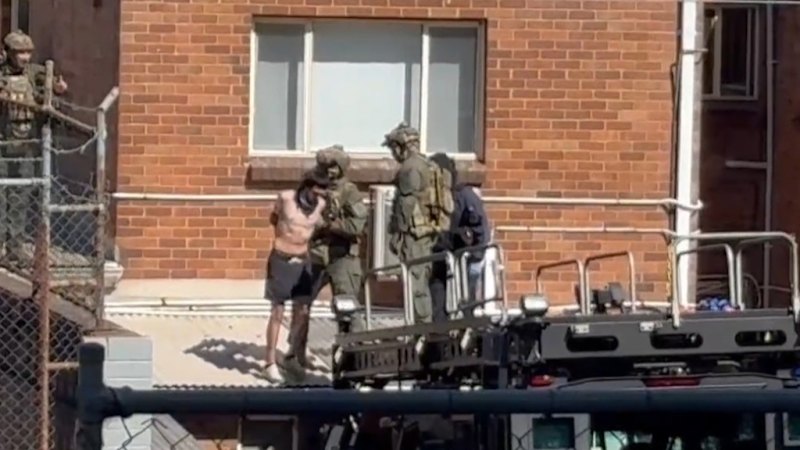 Man charged over stand-off with police at Sydney shopping centre