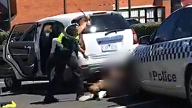 Policeman uses baton to beat teenager