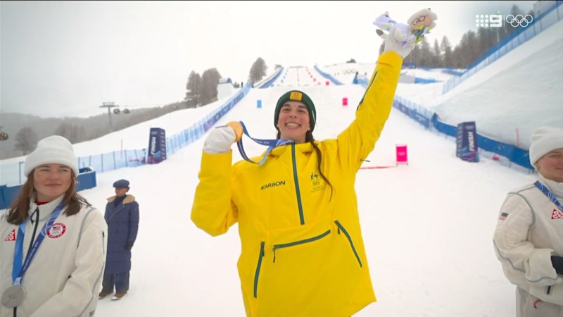 Anthony raises arms to celebrate gold