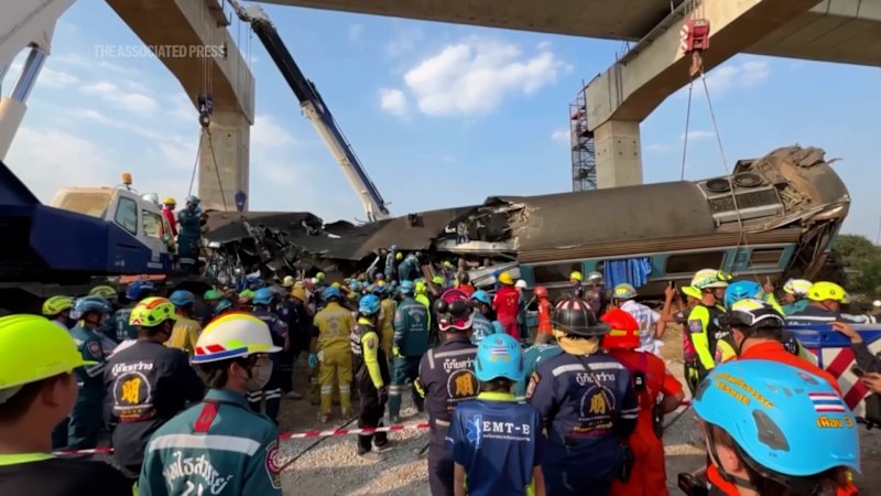 Construction crane falls onto moving train in Thailand, killing dozens