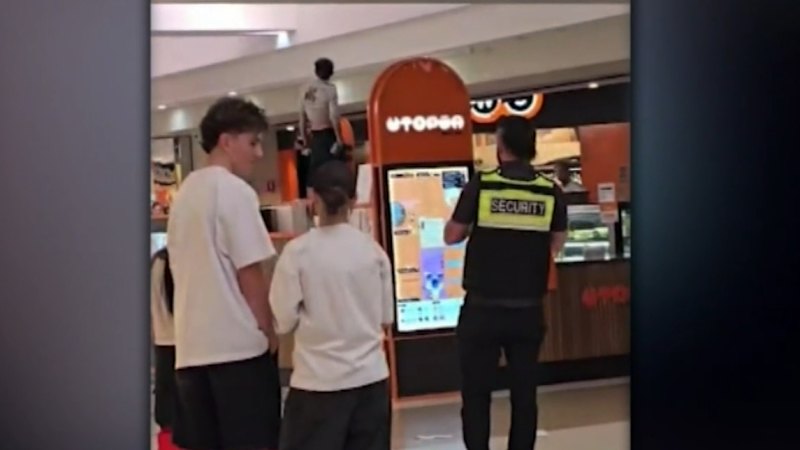 Shopping centre locked down, man arrested