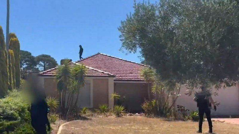 Teen jumps between roofs in hours-long standoff