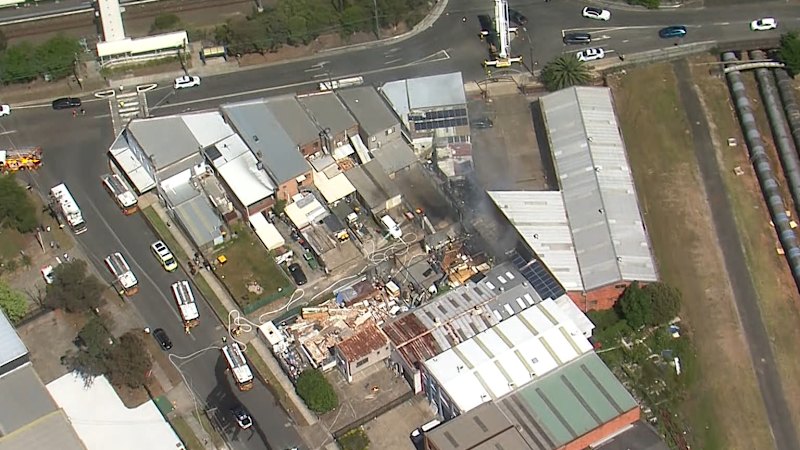 Dozens of firefighters battle blaze at furniture factory in Sydney’s west