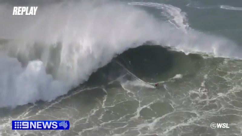Surfers take on 60-foot waves