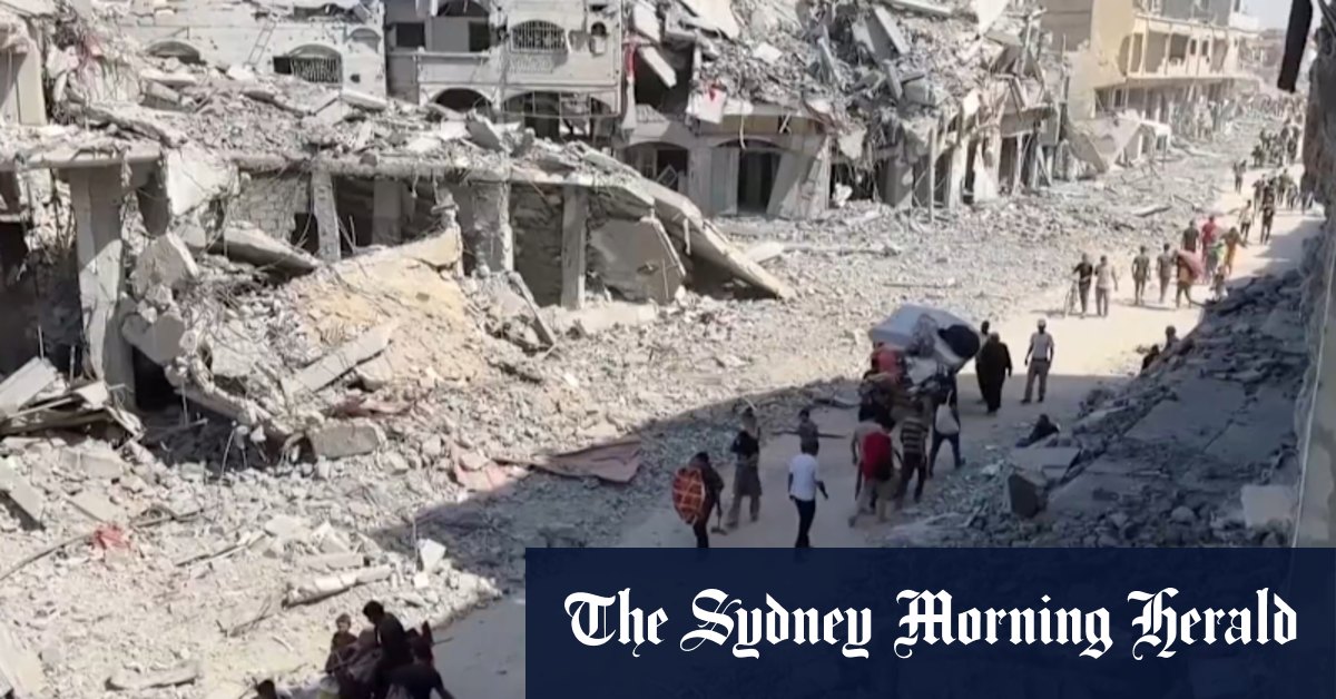 Thousands of Palestinians return to what remains of their homes as Gaza ceasefire begins