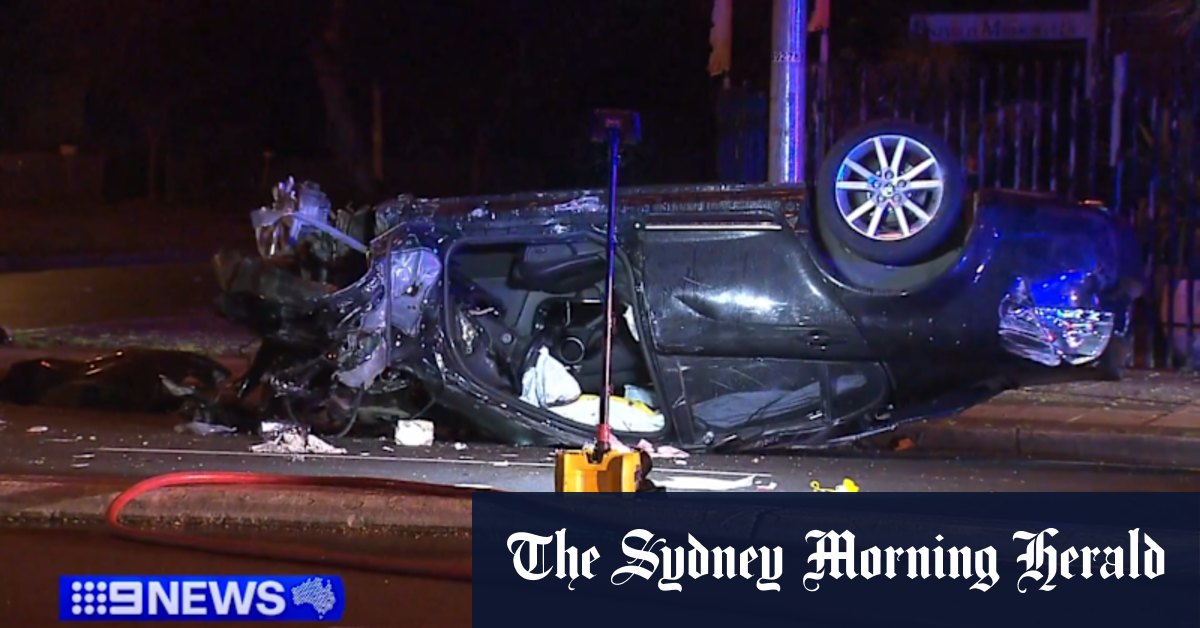 Car flips and crashes into house