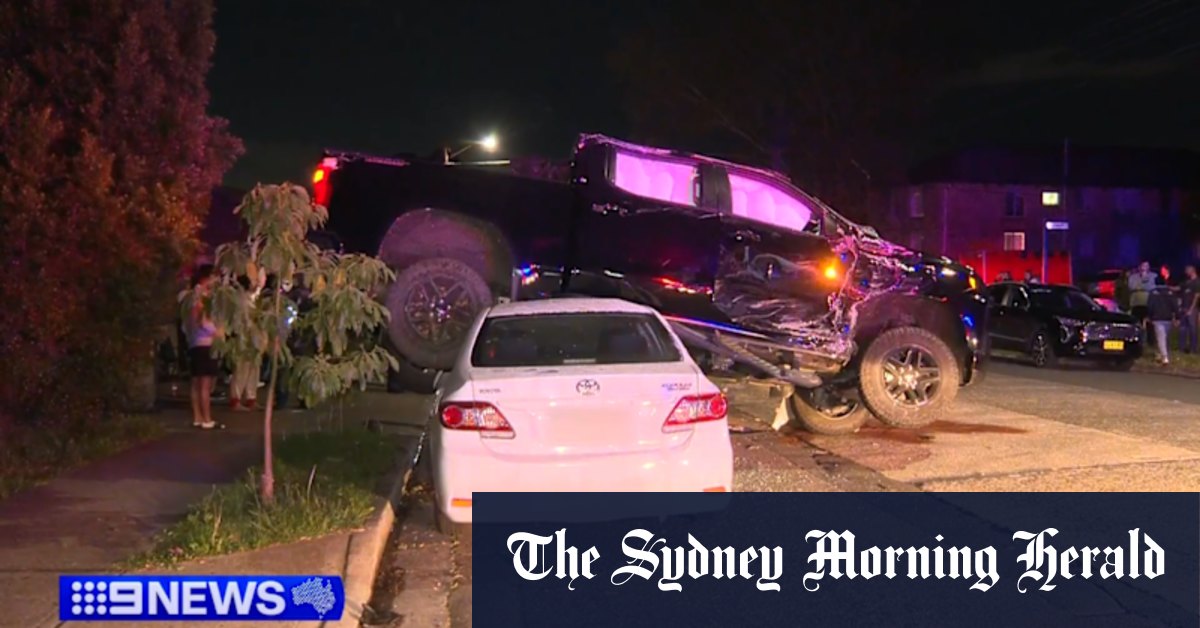 SUV smashes into parked cars, lands on Toyota Corolla on Sydney street
